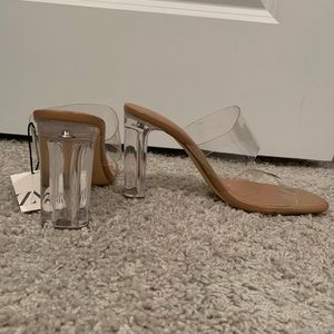 Nude heels with clear straps